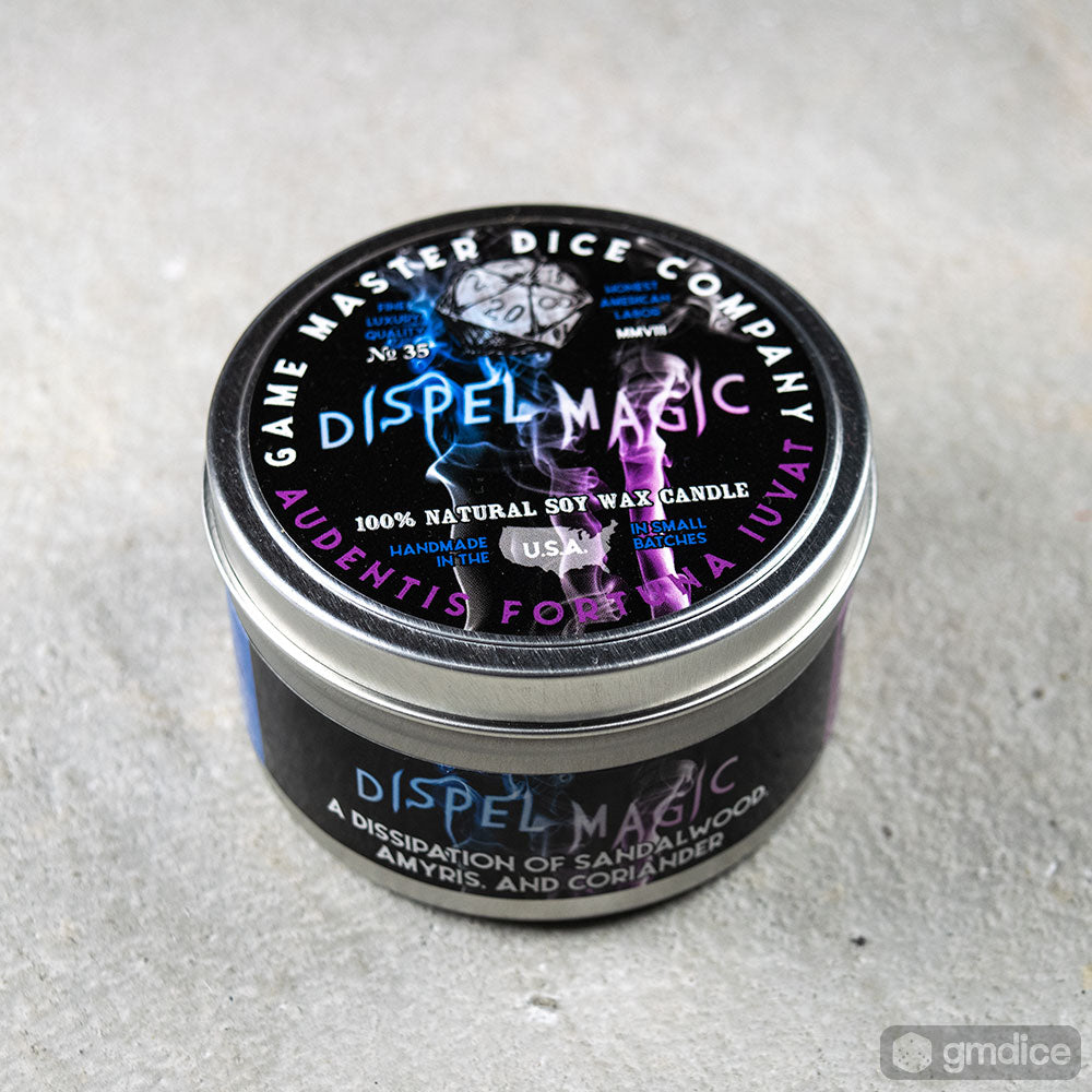 Dispel Magic Gaming Candle - Small black glass jar with silver lid, labeled "Dispel Magic" with blue and purple text and magical-themed graphics.