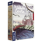 The White Castle - Board game box featuring an illustrated white Japanese-style castle on a snowy cliff with a red bridge over a river in the.