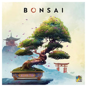 Bonsai - Intricately shaped bonsai tree with lush green foliage and pink blossoms in a decorative rectangular pot.