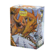Dragon Shield Dual Matte Art Sleeves 100ct - The Millerax - Box of Dragon Shield Dual Matte Art Sleeves featuring orange dragon artwork, 100-count card protector sleeves.