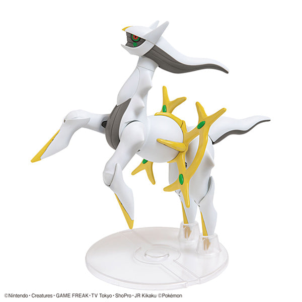 Pokémon Model Kit - Arceus (PREORDER) - White and gold Arceus model kit with green gem details, posed on a clear circular stand.