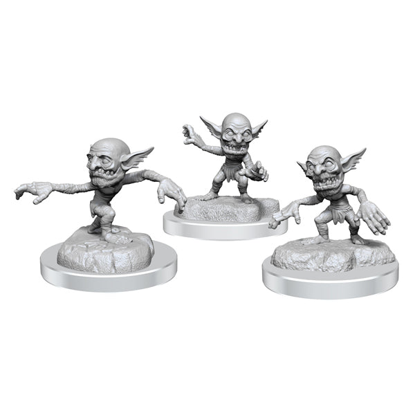 D&D Nolzur's Marvelous Miniatures: Boggles - Three unpainted gray plastic fantasy miniatures of boggles with large ears and wide eyes, each posed differently on round.