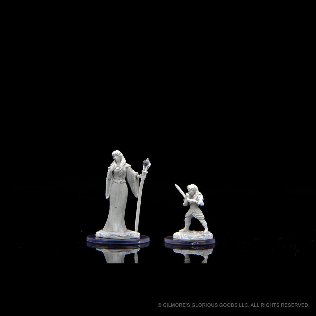 Critical Role Mini: Hum Wiz Fem & Halflin HW Fem - A tall female wizard holding a staff and a small halfling wielding a weapon, both in dynamic fantasy poses.