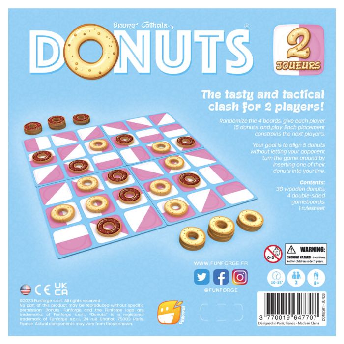 Donuts - Donuts-themed board game with a pink and blue checkered grid and donut-shaped playing pieces in various colors.