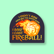 I Said I Cast Fireball! DnD Sticker - Dark purple die-shaped sticker with fiery orange and yellow flames and the text "I didn't ask how big the room was Said I.