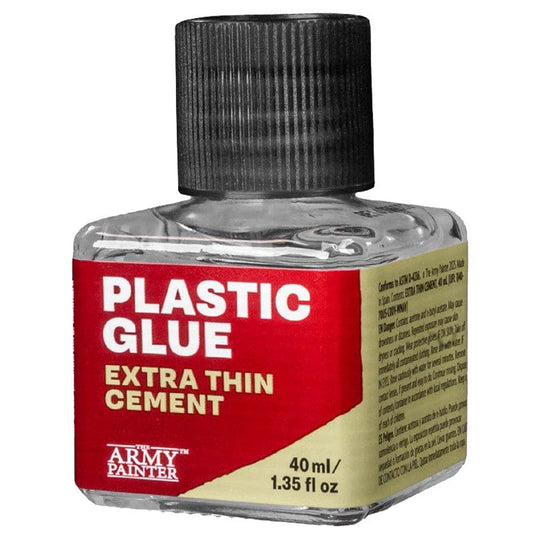 Army Painter Extra Thin Cement Plastic Glue - 40ml clear plastic glue bottle with black ribbed cap, red and beige label, white and yellow text.