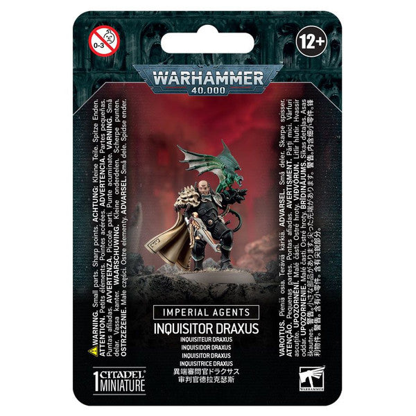 Warhammer 40,000 - Imperial Agents - Inquisitor Draxus - Warhammer 40,000 Inquisitor Draxus miniature in black armor with gold and green accents, holding a large weapon and wearing.