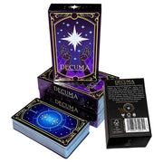 Decuma: The R&D for Your RPG - Purple tarot deck box with gold and white celestial designs, including stars and hands, accompanied by a matching card.