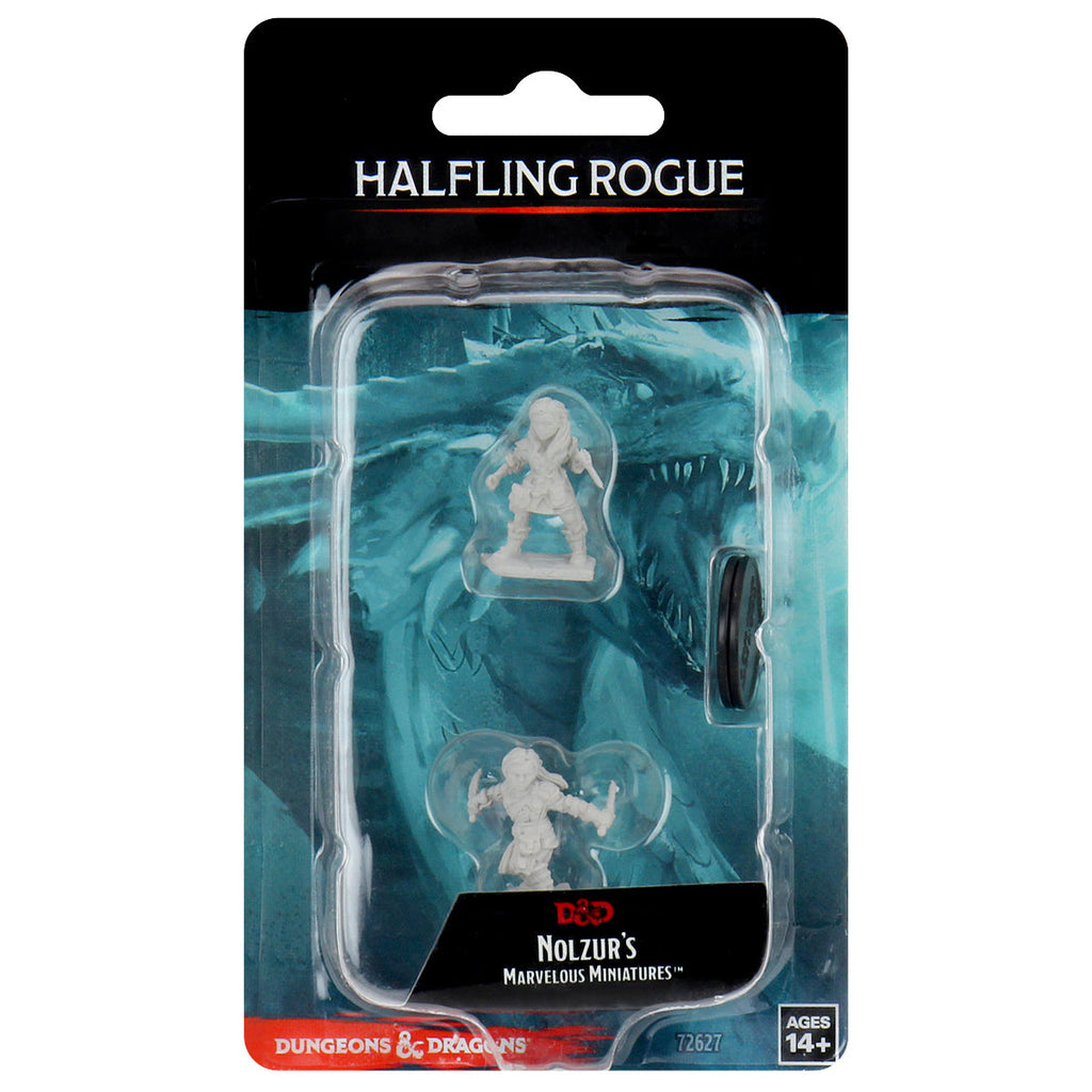 D&D Nolzur's Marvelous Miniatures: Halfling Female Rogue - Unpainted beige resin miniature of a small female halfling rogue wielding a dagger, in protective plastic blister pack with.