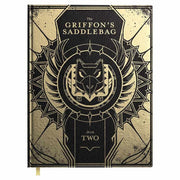 D&D 5E: The Griffon's Saddlebag Book Two Deluxe Edition - Tan and black hardcover book titled The Griffon's Saddlebag Book Two with ornate griffon emblem and decorative border.
