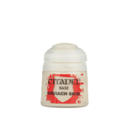 Citadel Base Paint: Ionrach Skin - Small clear plastic pot of Citadel Base Paint in pale beige shade labeled Ionrach Skin with red and black text on white.