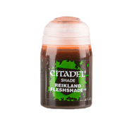 Citadel Shade Paint: Reikland Flesh - Small transparent paint pot with dark brown Citadel Shade Reikland Flesh label and light orange paint visible inside.