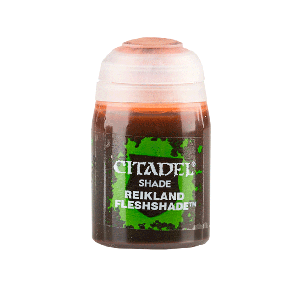 Citadel Shade Paint: Reikland Flesh - Small transparent paint pot with dark brown Citadel Shade Reikland Flesh label and light orange paint visible inside.
