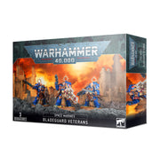 Warhammer 40,000 - Space Marines - Bladeguard Veterans - Set of three blue-armored Space Marines Bladeguard Veterans with gold and white detailing, heavy armor and melee weapons,.