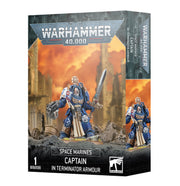 Warhammer 40,000 - Space Marines - Captain in Terminator Armour - Blue and silver armored Space Marine Captain miniature holding a sword and bolt pistol on a war-torn base.