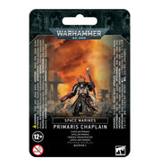 Warhammer 40,000 - Space Marines - Primaris Chaplain - Warhammer 40,000 Primaris Chaplain miniature with black armor, skull helmet, staff, and gold accents on black card backing.