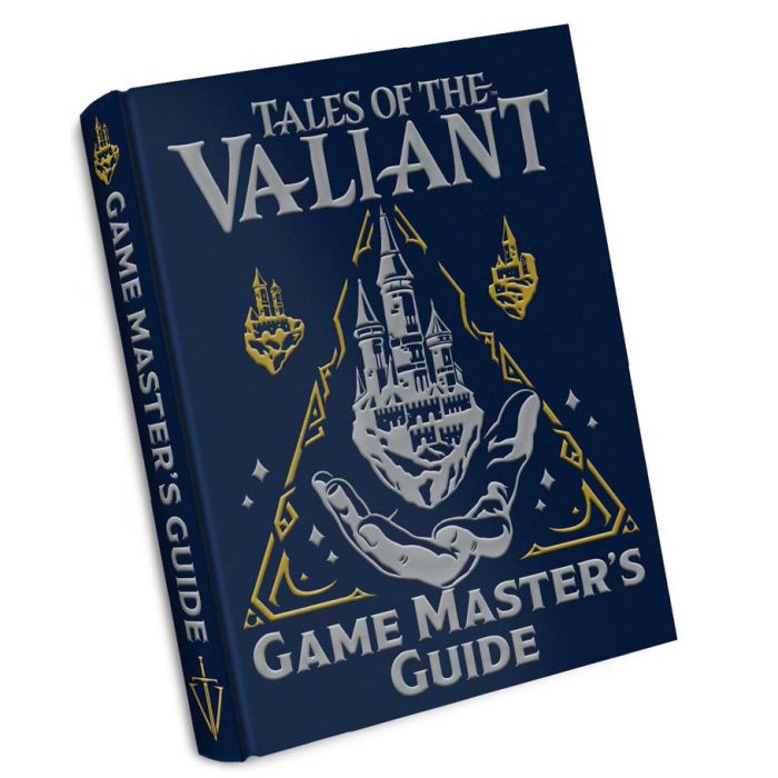 Tales of the Valiant: Game Master's Guide Limited Edition - Dark blue hardcover book with silver and gold embossed fantasy design of a castle within a hand and mystical symbols titled.