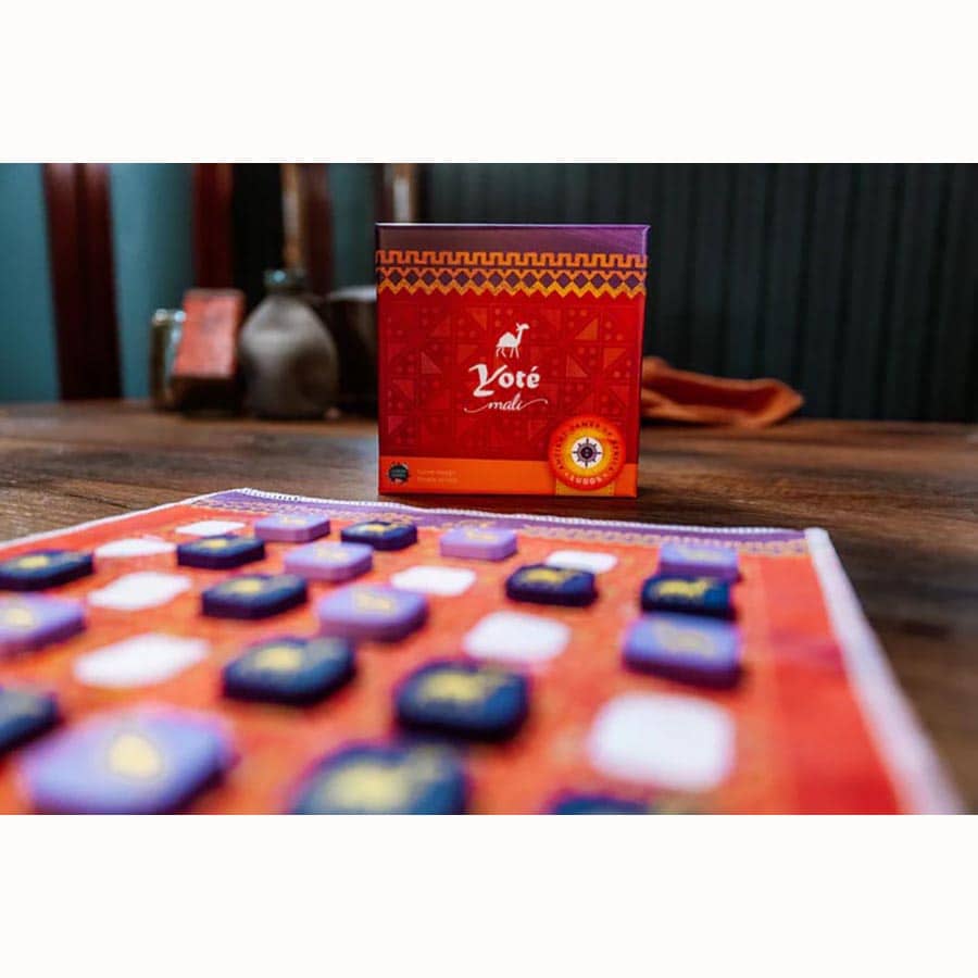 Ludos Africa Collection - Ludos Africa Collection board game with colorful square pieces on an orange board and red box with African patterns.