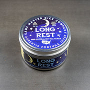 Long Rest Gaming Candle - Blue metal tin candle labeled Long Rest with moon and star graphics, natural soy wax, and decorative white and gold.