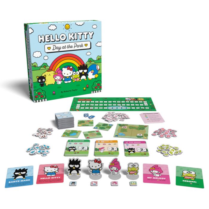 Hello Kitty: Day at the Park - Hello Kitty board game with colorful character cards, a green score track, and illustrated game pieces on a white surface.
