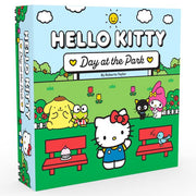 Hello Kitty: Day at the Park - Square box with colorful Hello Kitty characters playing in a green park under a blue sky with clouds and sun.