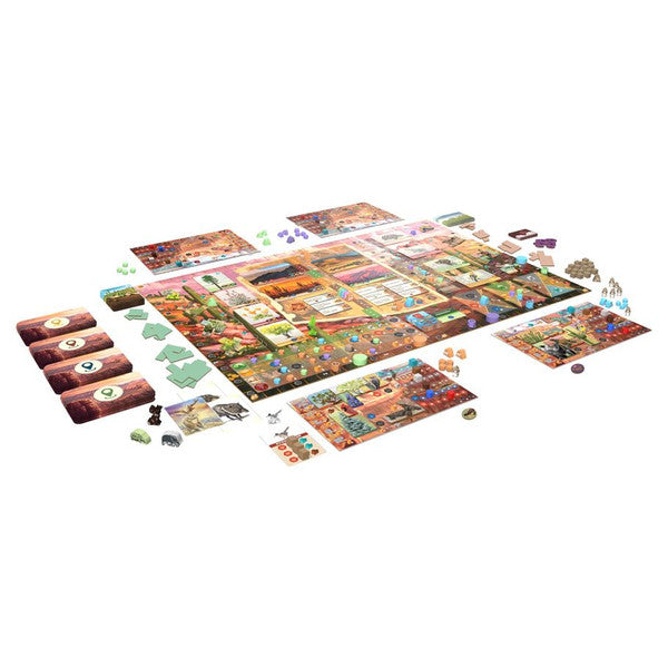 Trailblazer: The Arizona Trail - Board game setup with colorful illustrated tiles, cards, and character pieces on a white background.