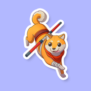 Monk Class D&D Dog Sticker - Orange Shiba Inu dog with a red scarf holding a red and white staff in a playful pose sticker.