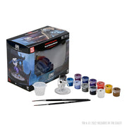 Paint Night Kit: D&S Nolzur's Marvelous Minis Oni - Paint Night Kit with unpainted oni miniature, two fine paintbrushes, 12 small paint pots in various colors, and a water cup,
