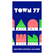 Town 77 - Town 77 card game box with bold blue background and stylized geometric houses in green, coral, and white.