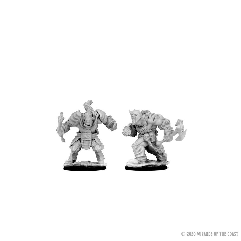 D&D Nolzur's Marvelous Minis: Orcs - Two unpainted gray plastic orc miniatures, one wielding a large axe and shield, the other holding a spiked club, detailed.