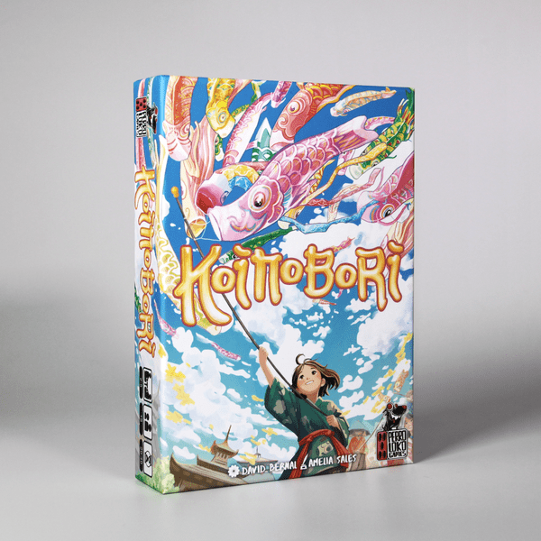 Koinobori - Colorful card game box featuring vibrant koi fish swimming in a blue sky with white clouds and a child reaching upward on.