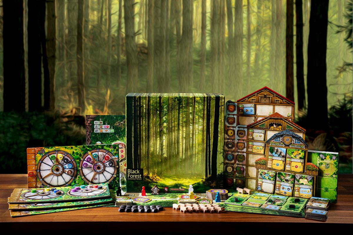 Black Forest (PREORDER) - Strategy board game set with forest-themed artwork, colorful game pieces, cards, and boards arranged on a wooden surface.