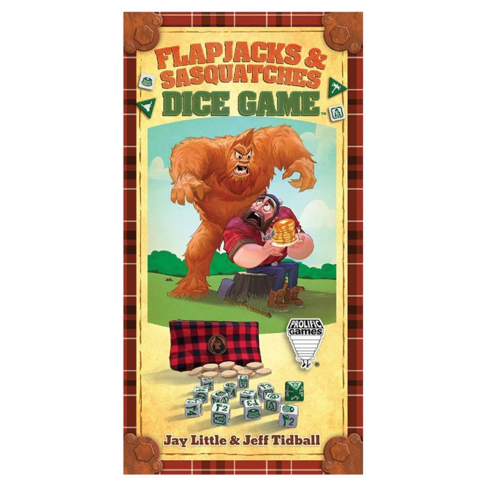 Flapjacks & Sasquatches Dice Game - Colorful board game box with cartoon sasquatch and lumberjack characters, includes dice and plaid pouch on a wooden.