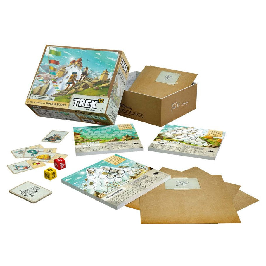 Trek 12 - Trek 12 family board game with illustrated mountain cards, dice, and score sheets on a table.