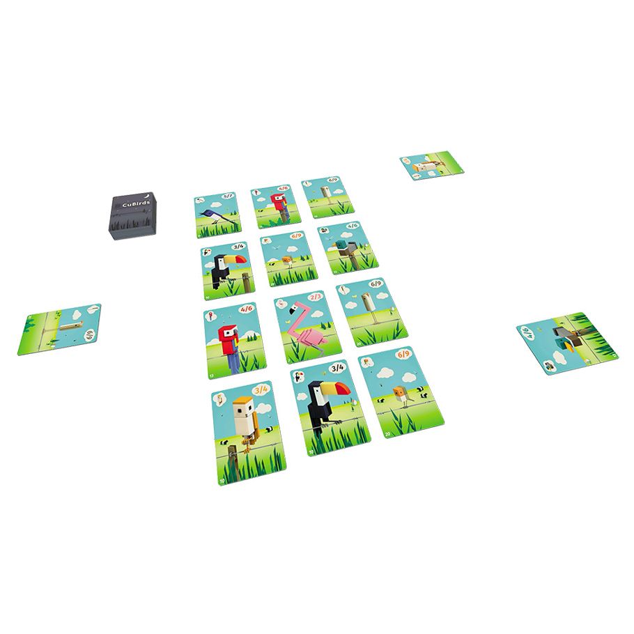 CuBirds - Square bird-themed playing cards with colorful cartoon illustrations arranged in a grid, black game box nearby.