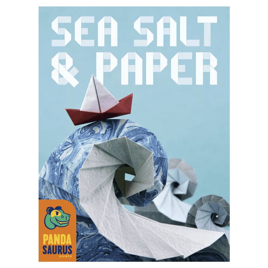 Sea Salt & Paper - Blue and white card game box with origami waves and paper boat illustration, bold white text Sea Salt & Paper.