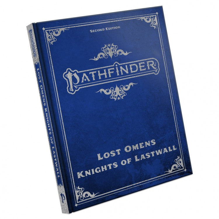 Path Finder 2nd Edition: Lost Omens: Knights of Lastwall - Dark blue hardcover book with ornate silver detailing and "Pathfinder Lost Omens Knights of Lastwall" printed on the cover.