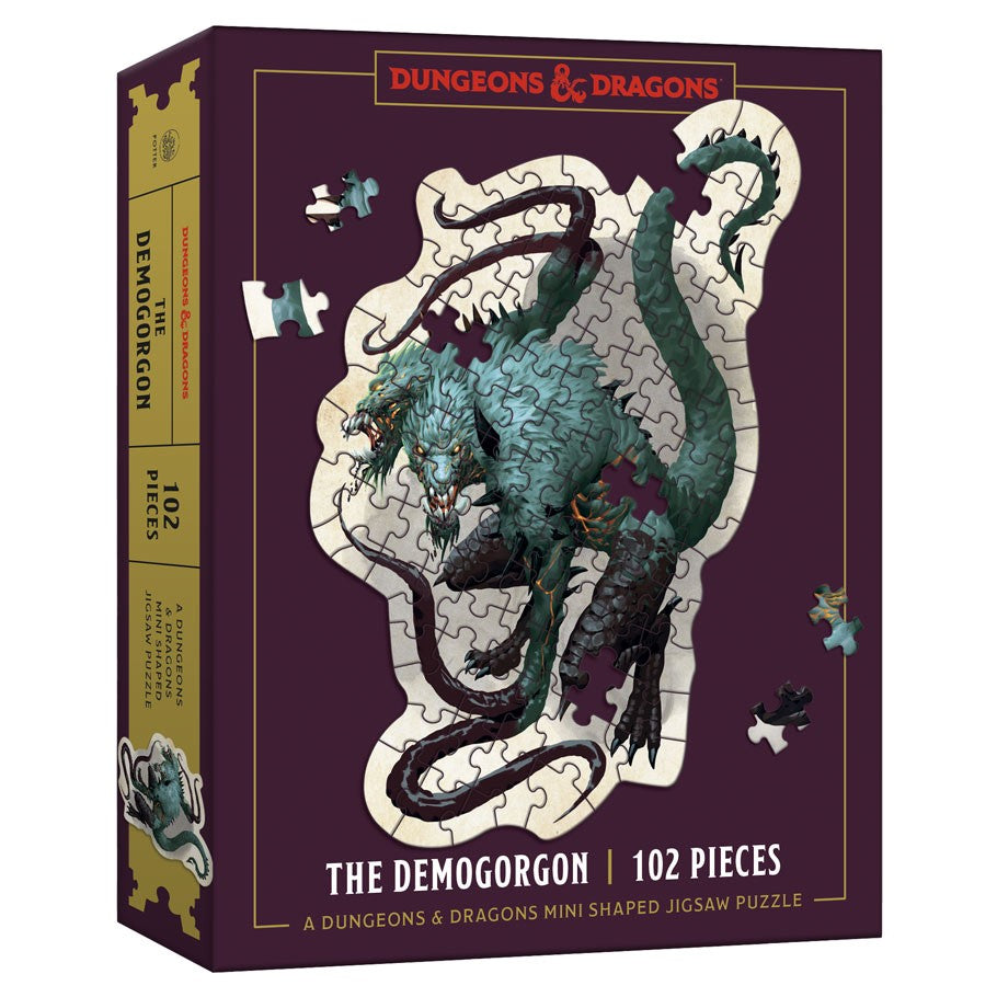 D&D Mini Demogorgon 102 Piece Puzzle - D&D puzzle box featuring a coiled, multi-headed blue-green Demogorgon with tentacles on a dark purple background.