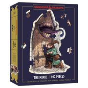 D&D Mini Mimic 102 Piece Puzzle - Dungeons & Dragons puzzle box featuring a 102-piece assembled puzzle of a stone mimic with a large open mouth and a warrior.
