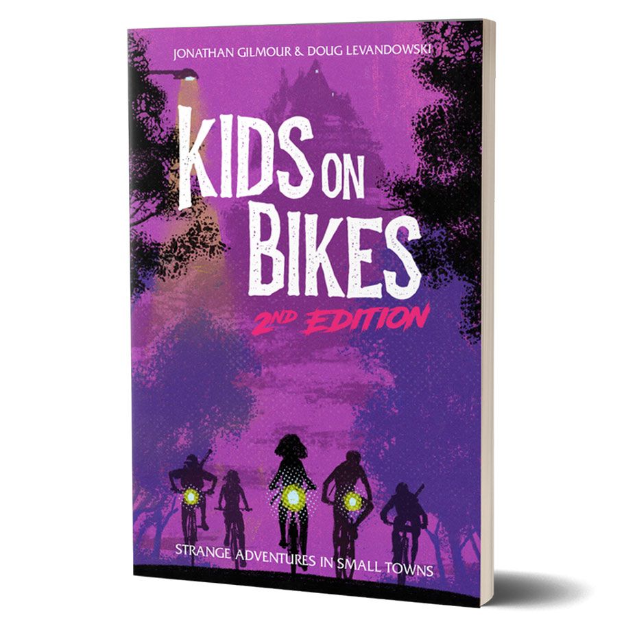 Kids on Bikes: Second Edition Core Rulebook - Purple book cover featuring silhouettes of four kids on bikes with glowing headlights, title "Kids on Bikes 2nd Edition" in.
