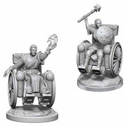 D&D Nolzur's Marvelous Miniatures: Human Clerics - Two unpainted gray plastic miniatures of human clerics, one seated holding a staff with a flame and the other in a.