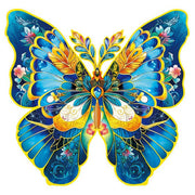 Puzzle Paradise: Morpho Helena Butterfly 200 piece - Vibrant butterfly-shaped puzzle featuring blue, yellow, and white wings with floral and heart patterns.