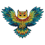 200 Piece Wooden Puzzle: Owl - Colorful wooden puzzle of an owl with outstretched wings in shades of blue, green, and orange.