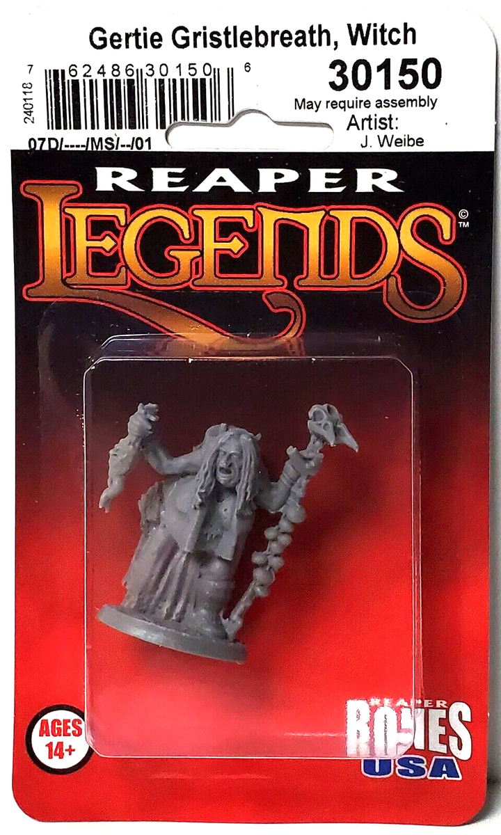 Gertie Gristlebreath - Unpainted gray plastic miniature of a witch holding a staff with a skull and wearing tattered robes and a hood.