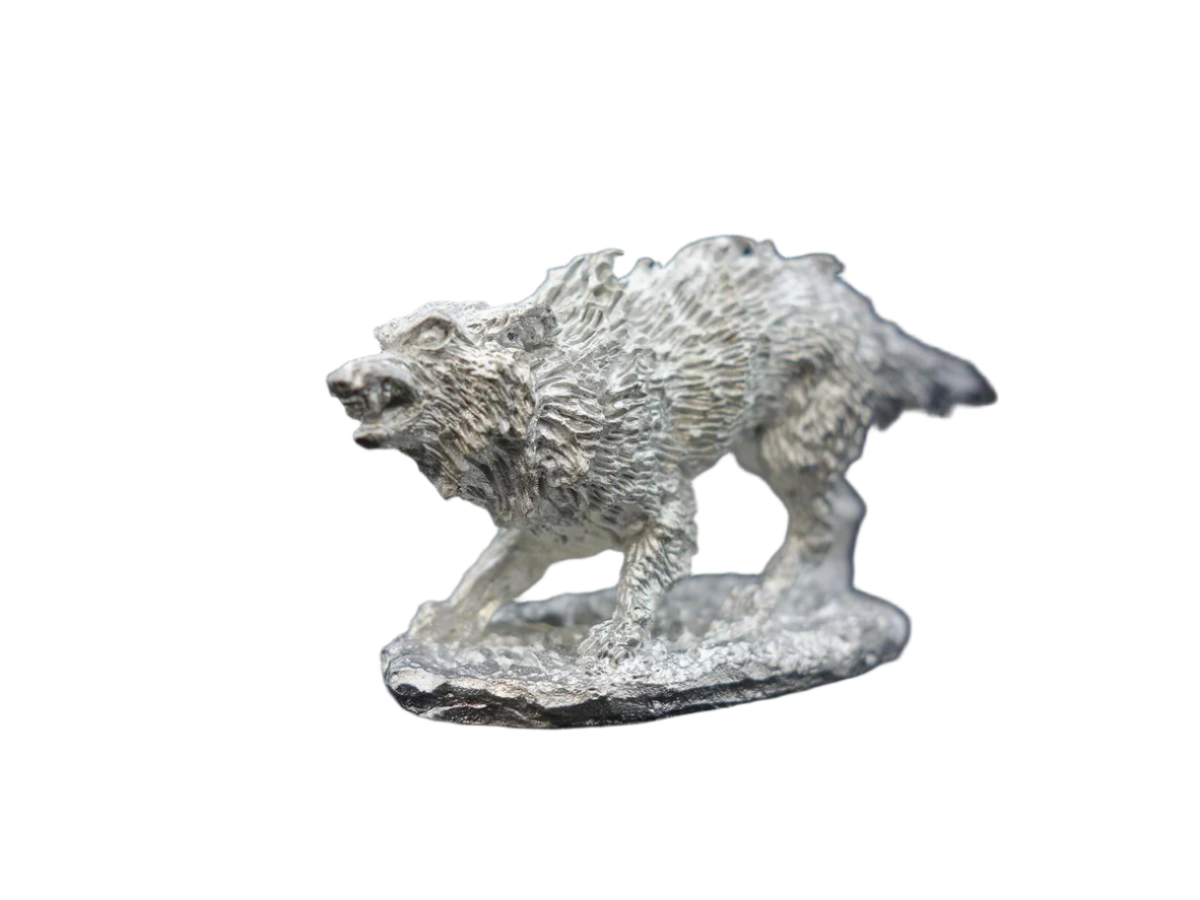 Winter Wolf - Gray textured wolf figurine in a walking pose on an irregular base.