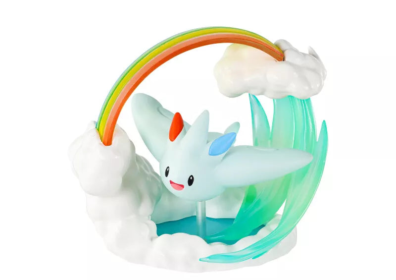 Re-Ment Pokémon Circular Diorama Blind Box - Individual - White and blue flying Pokémon figure with clouds and a rainbow arc diorama base.