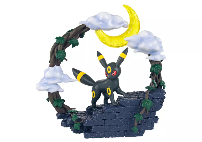 Re-Ment Pokémon Circular Diorama Blind Box - Individual - Circular diorama featuring black and yellow Umbreon figure on stone wall base, surrounded by brown vine arch, white clouds,.