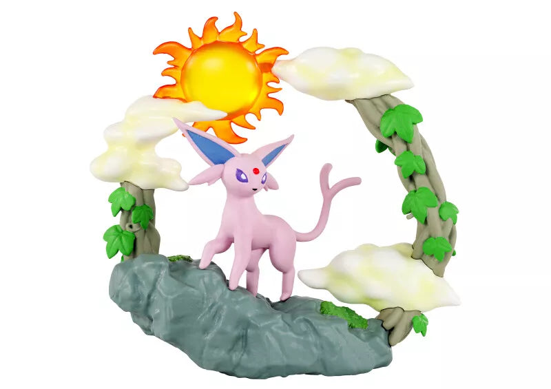 Re-Ment Pokémon Circular Diorama Blind Box - Individual - Pink Espeon Pokémon figure standing on gray rock base with green vine-covered arch and white clouds under bright.