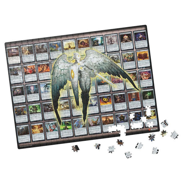 Puzzle: Magic the Gathering 500 piece - Artifacts - 500-piece Magic the Gathering puzzle featuring a large metallic winged artifact over a grid of colorful card illustrations.
