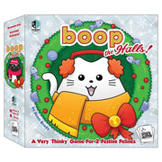 boop the Halls! - Square board game box featuring a white cat wearing a green elf hat and orange scarf inside a green holiday wreath decorated